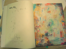 荒井良二氏の作品集「meta めた」に<br>サインとともに描いていただいた女の子<br>の絵です。女の子が手に持ってるのは？